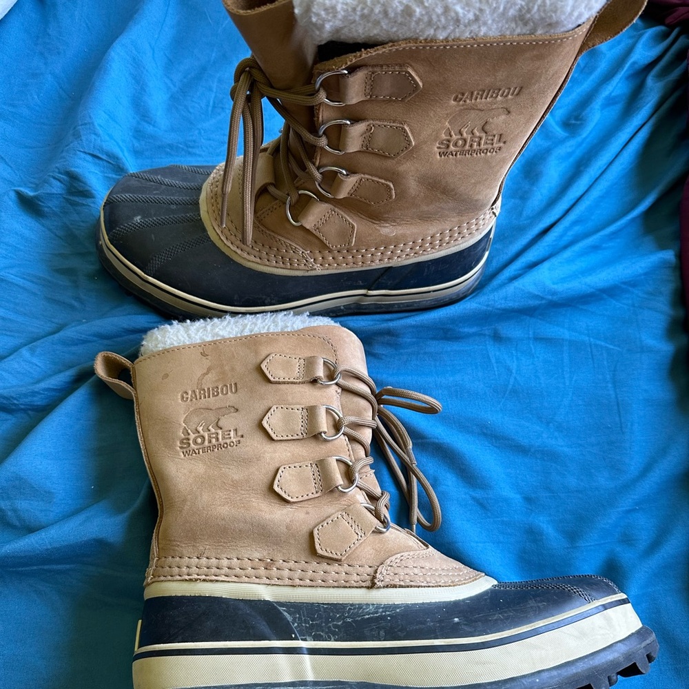 Caribou sorel waterproof winter boots.